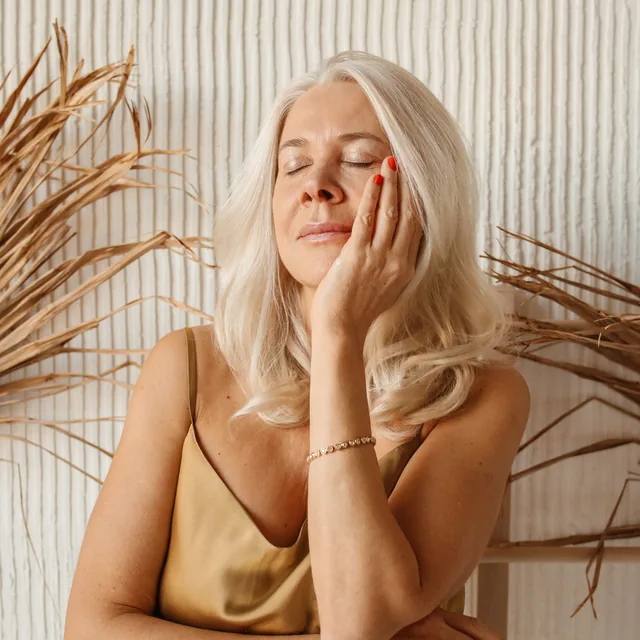 Woman considering a chemical skin peel for mature skin concerns