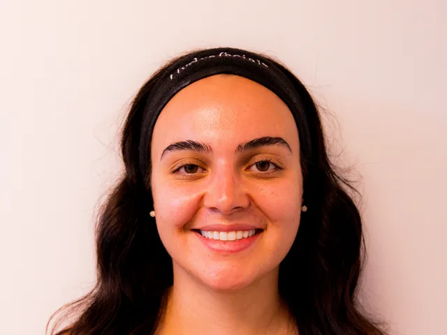 Smiling client with clear, even-toned skin after treatment at Forever Facial Aesthetics