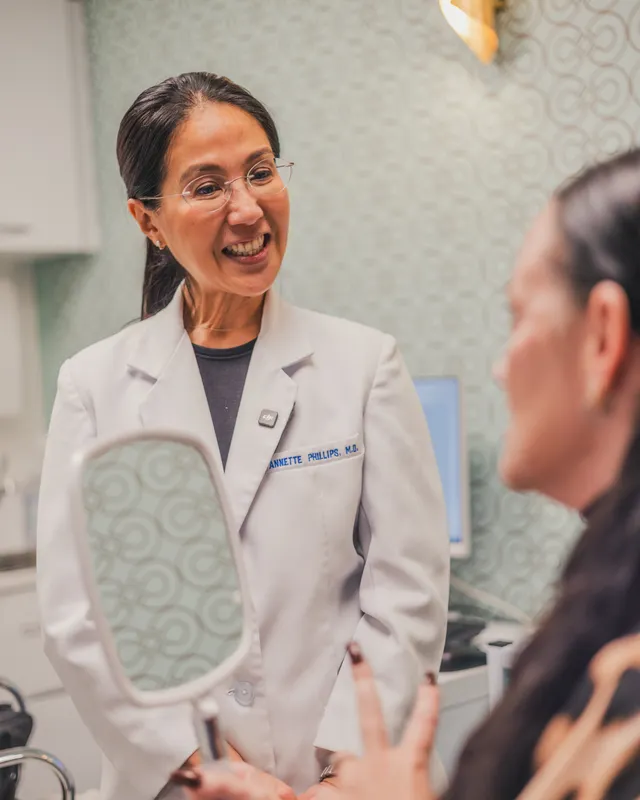 Dr Annette Phillips consulting with a patient at Forever Facial Aesthetics