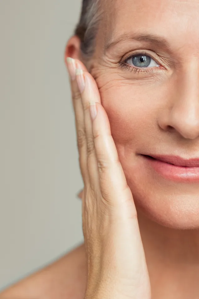 Woman with radiant, hydrated skin after a HydraFacial treatment